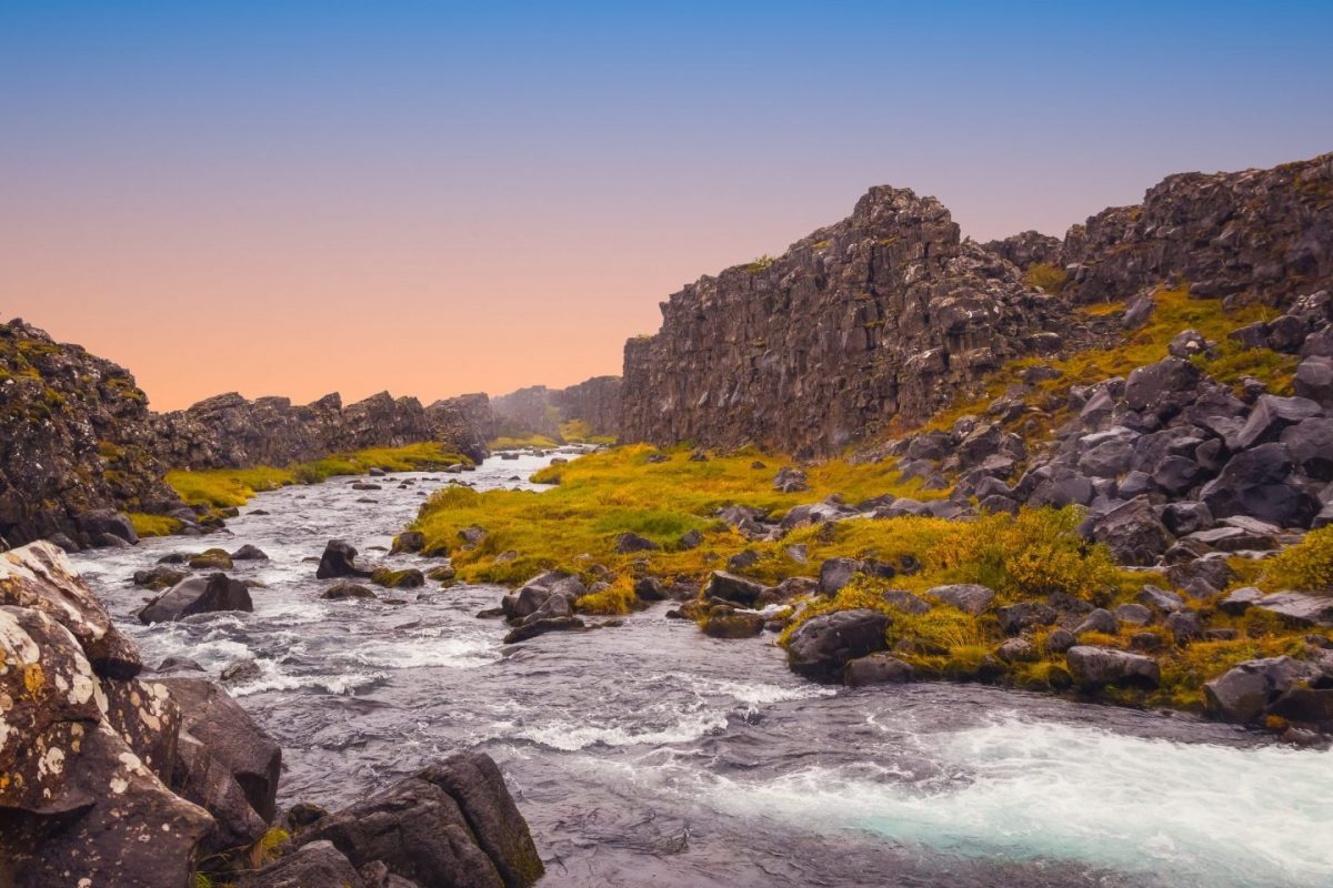 river running between two tectonic plates in thingvellir National Park iceland