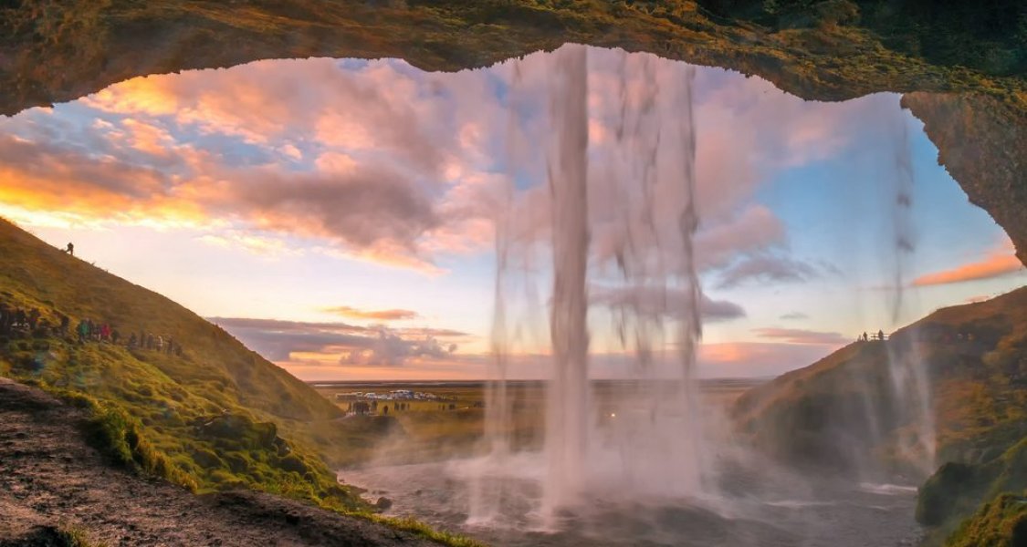 Sunset View From Behind Seljalandsfoss Most Famous Waterfall In iceland
