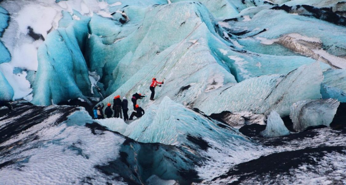 ice climbing on a glacier in iceland