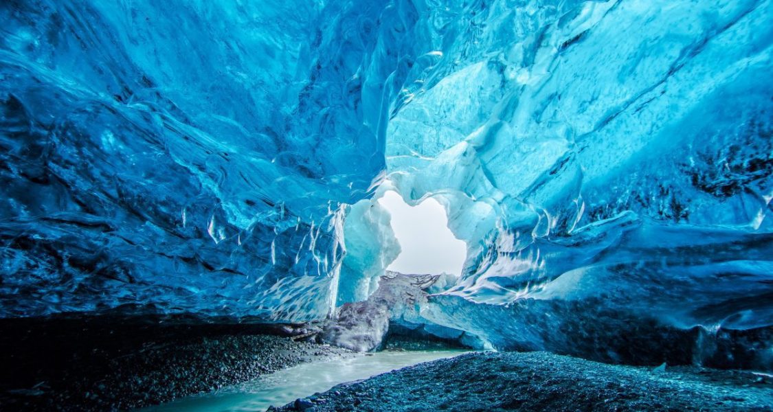 blue ice cave under the glacier in iceland